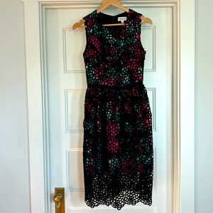 Anthropologie dress size 4. Unique lace overlay.